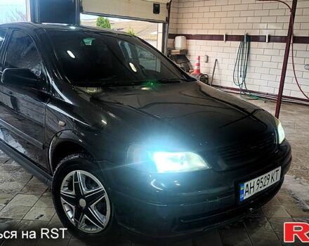 Черный Опель Астра, объемом двигателя 1.4 л и пробегом 190 тыс. км за 2400 $, фото 1 на Automoto.ua