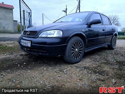 Черный Опель Астра, объемом двигателя 1.4 л и пробегом 256 тыс. км за 2150 $, фото 1 на Automoto.ua