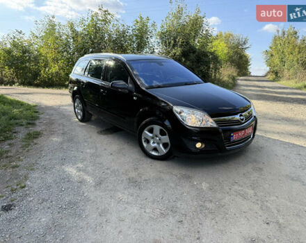Черный Опель Астра, объемом двигателя 1.8 л и пробегом 185 тыс. км за 5555 $, фото 1 на Automoto.ua