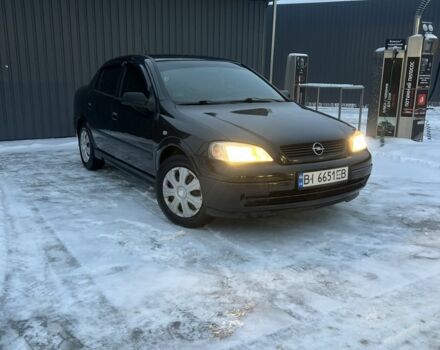 Чорний Опель Астра, об'ємом двигуна 1.6 л та пробігом 159 тис. км за 3900 $, фото 1 на Automoto.ua