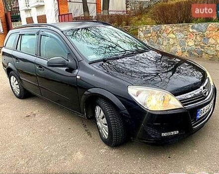 Черный Опель Астра, объемом двигателя 1.2 л и пробегом 250 тыс. км за 4100 $, фото 1 на Automoto.ua