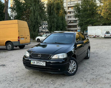 Черный Опель Астра, объемом двигателя 1.4 л и пробегом 220 тыс. км за 2600 $, фото 1 на Automoto.ua