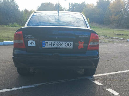 Черный Опель Астра, объемом двигателя 1.36 л и пробегом 290 тыс. км за 3900 $, фото 1 на Automoto.ua