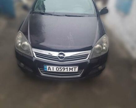 Черный Опель Астра, объемом двигателя 1.6 л и пробегом 180 тыс. км за 3800 $, фото 1 на Automoto.ua
