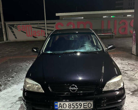 Черный Опель Астра, объемом двигателя 1.4 л и пробегом 338 тыс. км за 2300 $, фото 1 на Automoto.ua