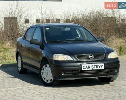 Черный Опель Астра, объемом двигателя 1.4 л и пробегом 159 тыс. км за 4300 $, фото 1 на Automoto.ua