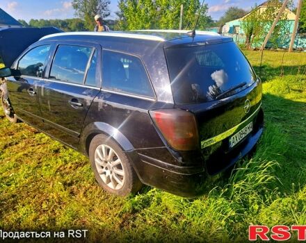 Черный Опель Астра, объемом двигателя 1.6 л и пробегом 207 тыс. км за 1450 $, фото 1 на Automoto.ua