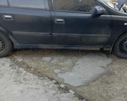 Черный Опель Астра, объемом двигателя 1.4 л и пробегом 171 тыс. км за 809 $, фото 1 на Automoto.ua