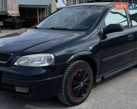 Черный Опель Астра, объемом двигателя 1.4 л и пробегом 270 тыс. км за 3000 $, фото 1 на Automoto.ua