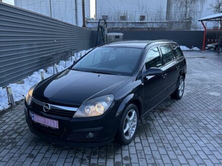 Черный Опель Астра, объемом двигателя 1.6 л и пробегом 228 тыс. км за 4400 $, фото 1 на Automoto.ua