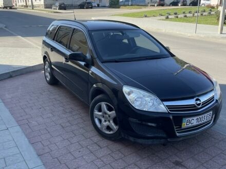 Черный Опель Астра, объемом двигателя 1.2 л и пробегом 296 тыс. км за 4350 $, фото 1 на Automoto.ua