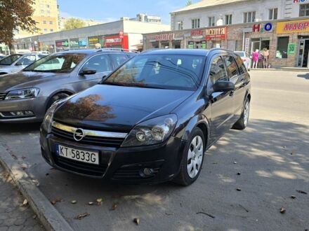 Черный Опель Астра, объемом двигателя 1.9 л и пробегом 200 тыс. км за 2650 $, фото 1 на Automoto.ua