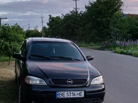 Черный Опель Астра, объемом двигателя 1.4 л и пробегом 268 тыс. км за 3500 $, фото 1 на Automoto.ua