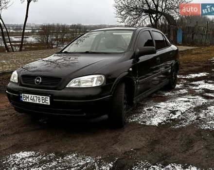 Черный Опель Астра, объемом двигателя 1.36 л и пробегом 207 тыс. км за 3100 $, фото 1 на Automoto.ua