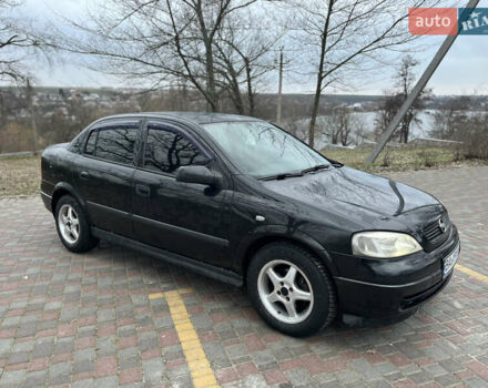 Черный Опель Астра, объемом двигателя 1.6 л и пробегом 247 тыс. км за 4400 $, фото 1 на Automoto.ua