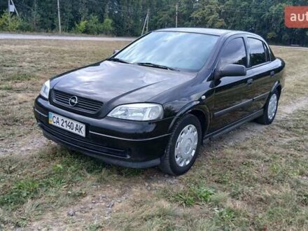 Чорний Опель Астра, об'ємом двигуна 1.4 л та пробігом 237 тис. км за 2999 $, фото 1 на Automoto.ua