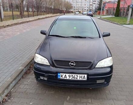 Черный Опель Астра, объемом двигателя 1.6 л и пробегом 285 тыс. км за 3300 $, фото 1 на Automoto.ua
