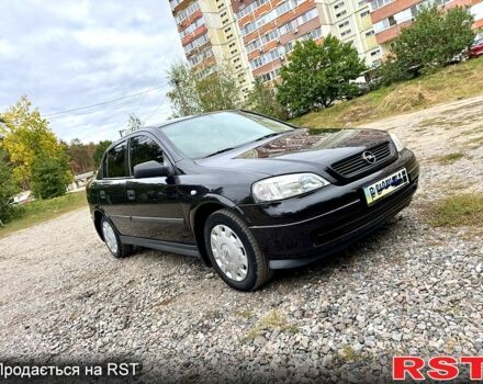Черный Опель Астра, объемом двигателя 1.4 л и пробегом 176 тыс. км за 4390 $, фото 1 на Automoto.ua