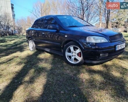 Черный Опель Астра, объемом двигателя 1.6 л и пробегом 270 тыс. км за 3300 $, фото 1 на Automoto.ua