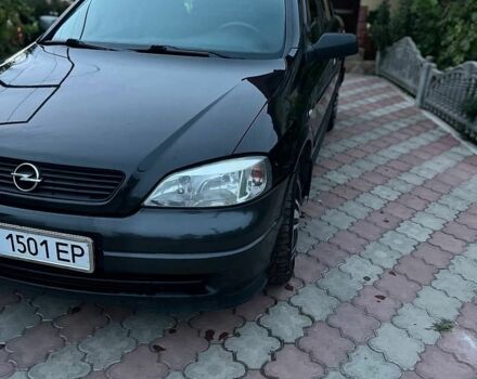 Черный Опель Астра, объемом двигателя 1.6 л и пробегом 207 тыс. км за 3500 $, фото 1 на Automoto.ua