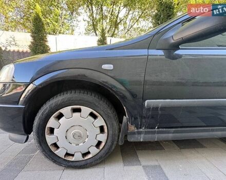 Черный Опель Астра, объемом двигателя 1.39 л и пробегом 142 тыс. км за 3500 $, фото 1 на Automoto.ua