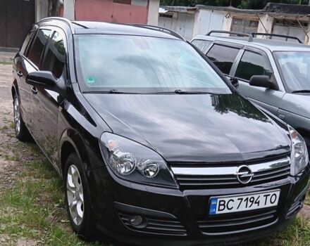Черный Опель Астра, объемом двигателя 1.8 л и пробегом 180 тыс. км за 5300 $, фото 1 на Automoto.ua