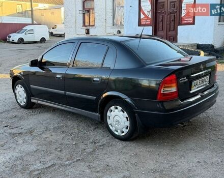 Черный Опель Астра, объемом двигателя 1.4 л и пробегом 200 тыс. км за 1550 $, фото 1 на Automoto.ua