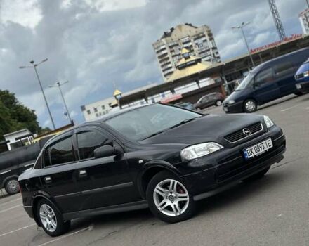 Черный Опель Астра, объемом двигателя 1.4 л и пробегом 277 тыс. км за 3300 $, фото 1 на Automoto.ua