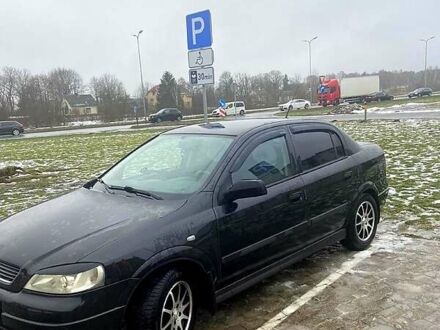 Чорний Опель Астра, об'ємом двигуна 1.4 л та пробігом 203 тис. км за 4500 $, фото 1 на Automoto.ua