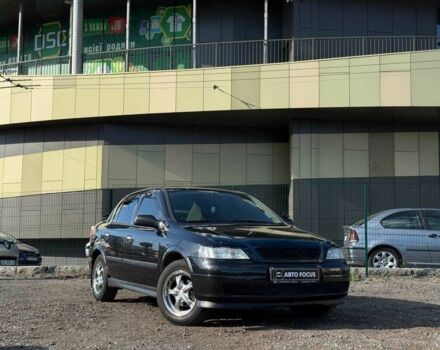 Черный Опель Астра, объемом двигателя 2 л и пробегом 260 тыс. км за 3790 $, фото 1 на Automoto.ua