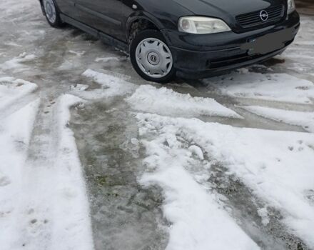 Черный Опель Астра, объемом двигателя 1.4 л и пробегом 270 тыс. км за 3100 $, фото 1 на Automoto.ua