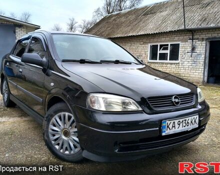 Черный Опель Астра, объемом двигателя 1.4 л и пробегом 250 тыс. км за 3999 $, фото 1 на Automoto.ua