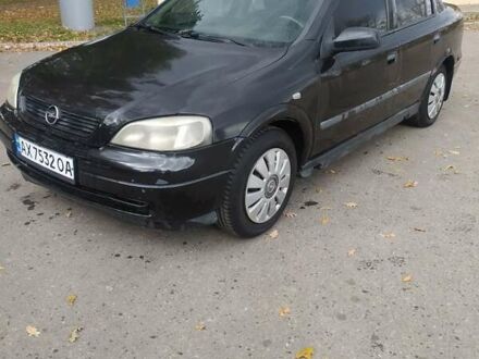 Черный Опель Астра, объемом двигателя 1.4 л и пробегом 207 тыс. км за 2450 $, фото 1 на Automoto.ua