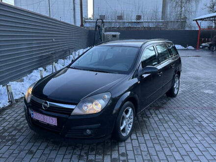 Черный Опель Астра, объемом двигателя 1.6 л и пробегом 228 тыс. км за 4400 $, фото 1 на Automoto.ua