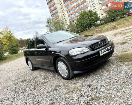 Черный Опель Астра, объемом двигателя 1.4 л и пробегом 176 тыс. км за 4390 $, фото 1 на Automoto.ua