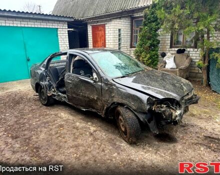 Черный Опель Астра, объемом двигателя 1.4 л и пробегом 195 тыс. км за 900 $, фото 1 на Automoto.ua