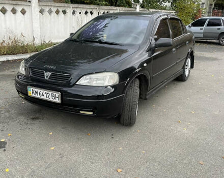 Черный Опель Астра, объемом двигателя 1.6 л и пробегом 150 тыс. км за 3800 $, фото 1 на Automoto.ua