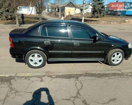 Черный Опель Астра, объемом двигателя 1.6 л и пробегом 164 тыс. км за 4500 $, фото 1 на Automoto.ua