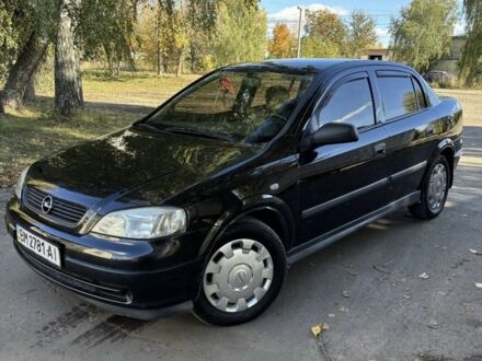 Черный Опель Астра, объемом двигателя 1.4 л и пробегом 250 тыс. км за 3700 $, фото 1 на Automoto.ua