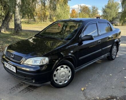 Черный Опель Астра, объемом двигателя 1.4 л и пробегом 250 тыс. км за 3700 $, фото 1 на Automoto.ua