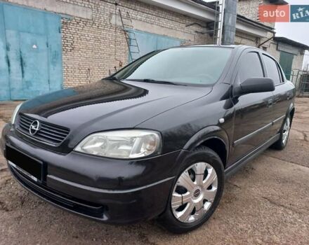 Черный Опель Астра, объемом двигателя 1.4 л и пробегом 230 тыс. км за 4500 $, фото 1 на Automoto.ua