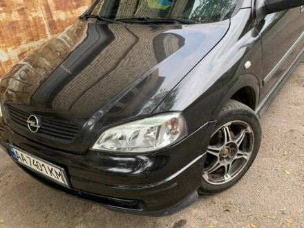 Черный Опель Астра, объемом двигателя 1.4 л и пробегом 250 тыс. км за 3200 $, фото 1 на Automoto.ua