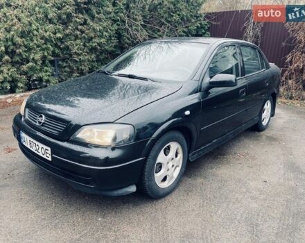 Черный Опель Астра, объемом двигателя 1.7 л и пробегом 334 тыс. км за 3400 $, фото 1 на Automoto.ua