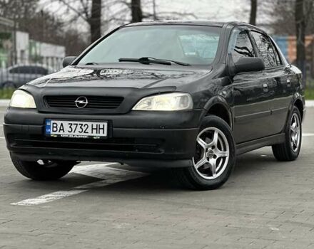 Черный Опель Астра, объемом двигателя 1.38 л и пробегом 320 тыс. км за 2900 $, фото 1 на Automoto.ua