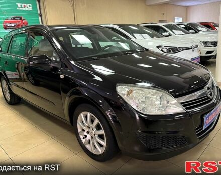 Черный Опель Астра, объемом двигателя 1.4 л и пробегом 210 тыс. км за 5600 $, фото 1 на Automoto.ua