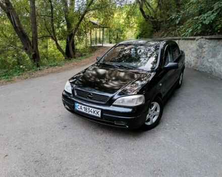 Черный Опель Астра, объемом двигателя 1.4 л и пробегом 260 тыс. км за 3100 $, фото 1 на Automoto.ua