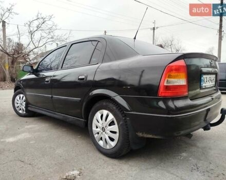 Черный Опель Астра, объемом двигателя 1.4 л и пробегом 220 тыс. км за 3999 $, фото 1 на Automoto.ua