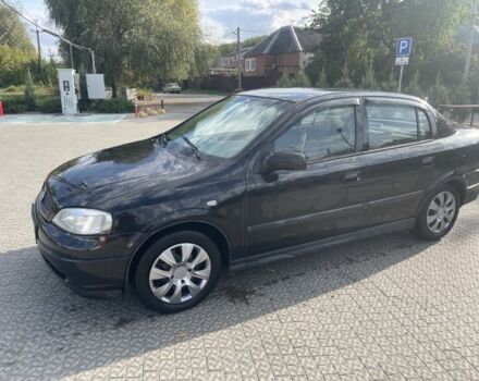 Черный Опель Астра, объемом двигателя 1.4 л и пробегом 212 тыс. км за 4000 $, фото 1 на Automoto.ua