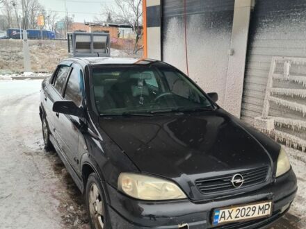 Чорний Опель Астра, об'ємом двигуна 1.6 л та пробігом 254 тис. км за 2400 $, фото 1 на Automoto.ua