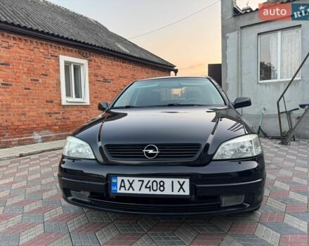 Черный Опель Астра, объемом двигателя 1.36 л и пробегом 176 тыс. км за 3500 $, фото 1 на Automoto.ua